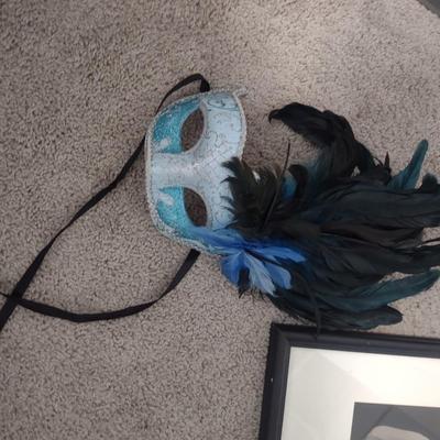 TWO MASQUERADE MASKS, ONE PHOTO
