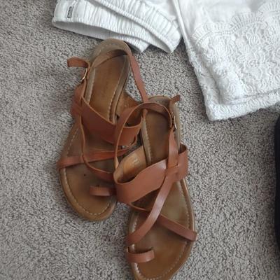 TWO WHITE DRESS PANTS, SANDALS, HOUSE SHOES.