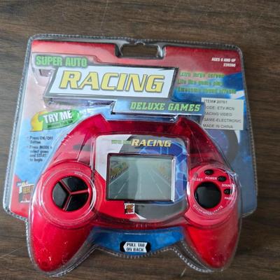 Children toys - New auto racing game - bottle - pacifier - assortment of vintage plush animals - backpack - puzzles- sports fan items and...