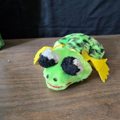 Children toys - New auto racing game - bottle - pacifier - assortment of vintage plush animals - backpack - puzzles- sports fan items and...