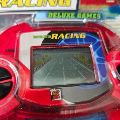 Children toys - New auto racing game - bottle - pacifier - assortment of vintage plush animals - backpack - puzzles- sports fan items and...