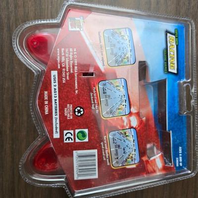 Children toys - New auto racing game - bottle - pacifier - assortment of vintage plush animals - backpack - puzzles- sports fan items and...