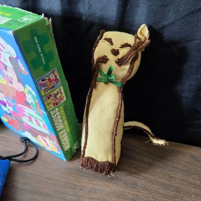 Children toys - New auto racing game - bottle - pacifier - assortment of vintage plush animals - backpack - puzzles- sports fan items and...