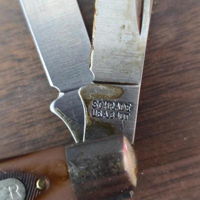 New Old timer pocketknife - large tooth necklaces - Coin counter = wallet and a new smart bracelet