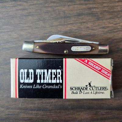 New Old timer pocketknife - large tooth necklaces - Coin counter = wallet and a new smart bracelet