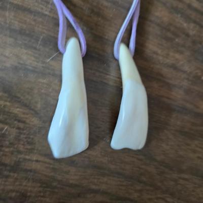 New Old timer pocketknife - large tooth necklaces - Coin counter = wallet and a new smart bracelet