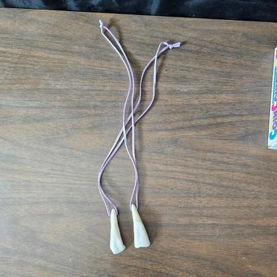 New Old timer pocketknife - large tooth necklaces - Coin counter = wallet and a new smart bracelet