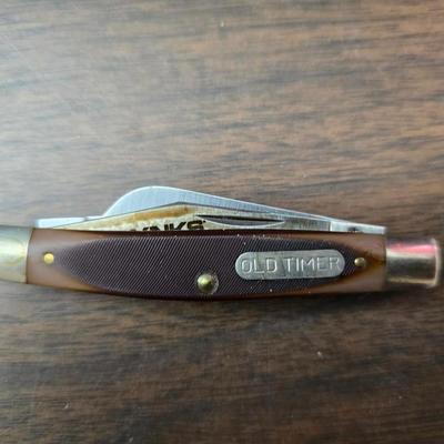 New Old timer pocketknife - large tooth necklaces - Coin counter = wallet and a new smart bracelet