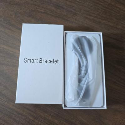 New Old timer pocketknife - large tooth necklaces - Coin counter = wallet and a new smart bracelet