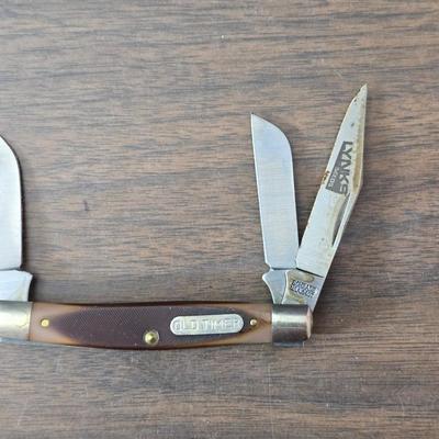 New Old timer pocketknife - large tooth necklaces - Coin counter = wallet and a new smart bracelet