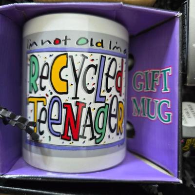 Collection of trinkets and gag gifts -cast Slot machine - iron on flag - Pez pal Pete with no feet -grow a date- horseshoe puzzle - over...