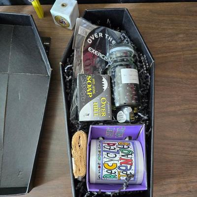 Collection of trinkets and gag gifts -cast Slot machine - iron on flag - Pez pal Pete with no feet -grow a date- horseshoe puzzle - over...