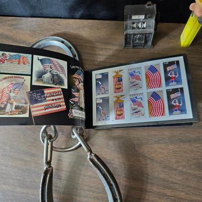 Collection of trinkets and gag gifts -cast Slot machine - iron on flag - Pez pal Pete with no feet -grow a date- horseshoe puzzle - over...