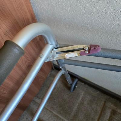 Mobility aide walker and bedside toilet with a vintage glass urinal