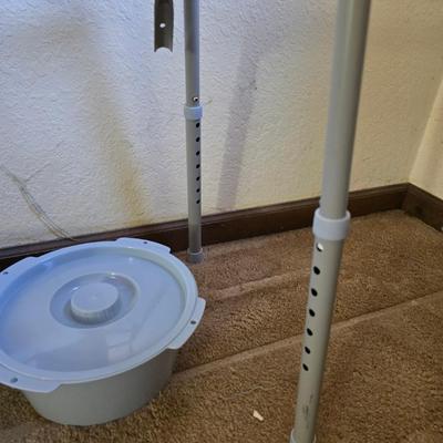 Mobility aide walker and bedside toilet with a vintage glass urinal
