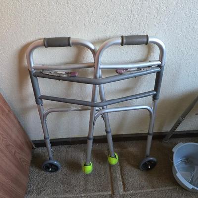 Mobility aide walker and bedside toilet with a vintage glass urinal