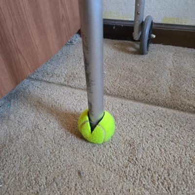 Mobility aide walker and bedside toilet with a vintage glass urinal