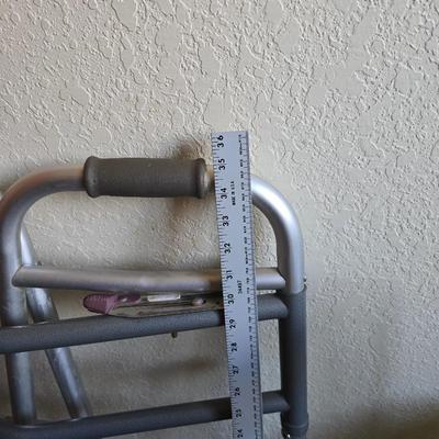 Mobility aide walker and bedside toilet with a vintage glass urinal