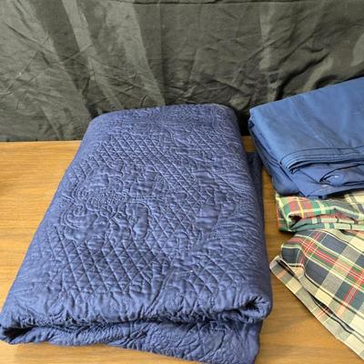 Blue full-sized bedspread with matching pillow case - plaid sheet set and a blue sheet set.