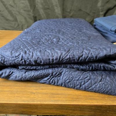 Blue full-sized bedspread with matching pillow case - plaid sheet set and a blue sheet set.