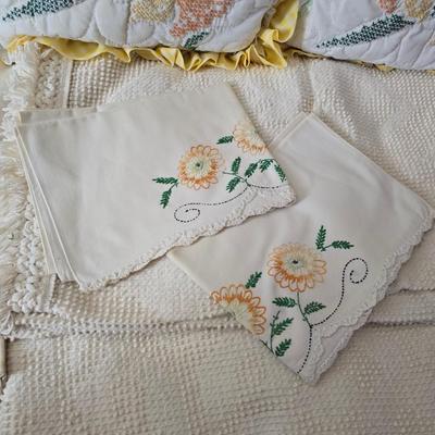 Vintage textured Chenille bedspread with several sheet sets and two vintage throw pillows