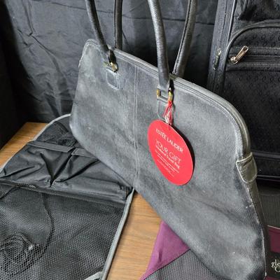 Carry-on luggage bag - with an assortment of other garment / luggage packing bags Eagle creek - Jaguar