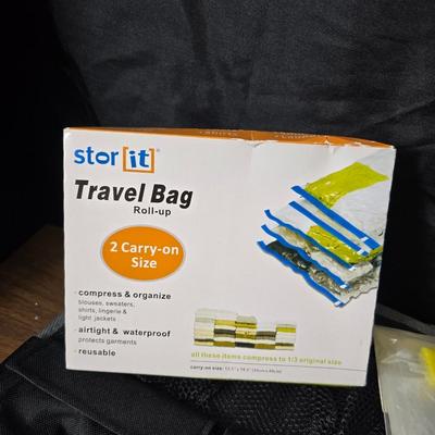 Carry-on luggage bag - with an assortment of other garment / luggage packing bags Eagle creek - Jaguar