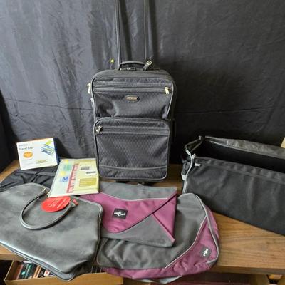 Carry-on luggage bag - with an assortment of other garment / luggage packing bags Eagle creek - Jaguar