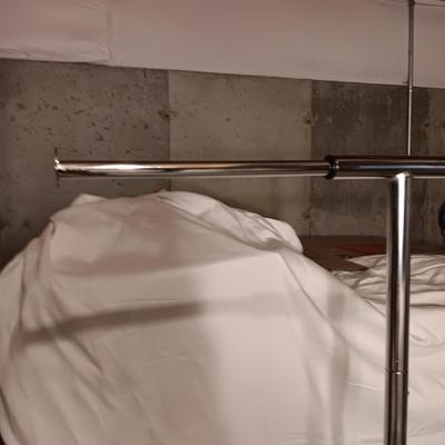 ADJUSTABLE CLOTHING RACK AND A FOLDING GARMENT RACK