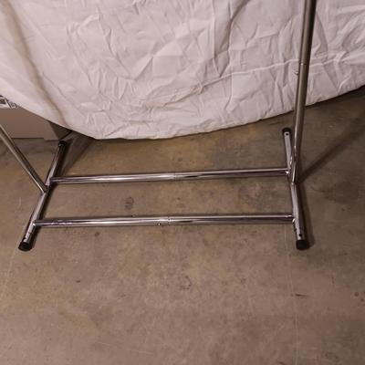 ADJUSTABLE CLOTHING RACK AND A FOLDING GARMENT RACK