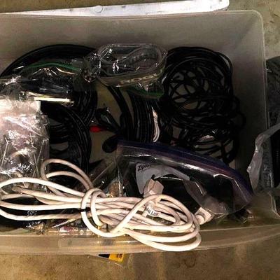BOX OF MISC CORDS, HDMI, EXTENSION, CABLE AUXILIARY AND A LARGE BAG OR CORD COVER