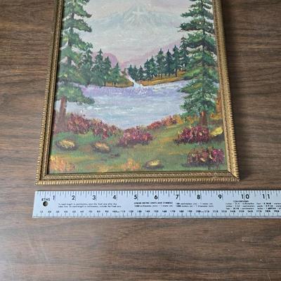 Collecion of vintage home decor - Antique picture frames with prints - windmill music box - old lamp with shade and two men in a canoe