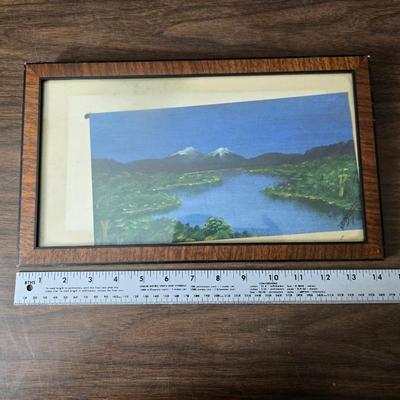 Collecion of vintage home decor - Antique picture frames with prints - windmill music box - old lamp with shade and two men in a canoe