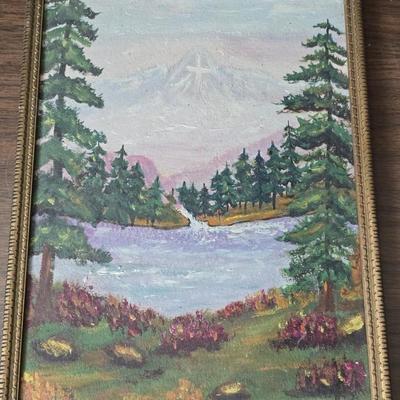 Collecion of vintage home decor - Antique picture frames with prints - windmill music box - old lamp with shade and two men in a canoe