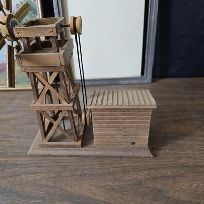 Collecion of vintage home decor - Antique picture frames with prints - windmill music box - old lamp with shade and two men in a canoe