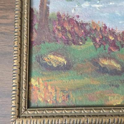 Collecion of vintage home decor - Antique picture frames with prints - windmill music box - old lamp with shade and two men in a canoe