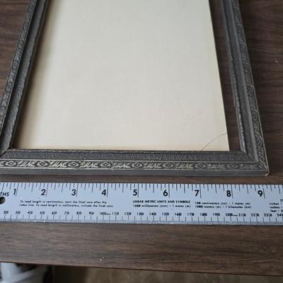 Collecion of vintage home decor - Antique picture frames with prints - windmill music box - old lamp with shade and two men in a canoe