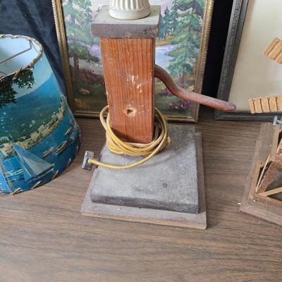 Collecion of vintage home decor - Antique picture frames with prints - windmill music box - old lamp with shade and two men in a canoe