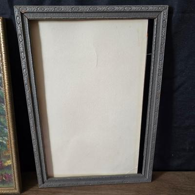 Collecion of vintage home decor - Antique picture frames with prints - windmill music box - old lamp with shade and two men in a canoe