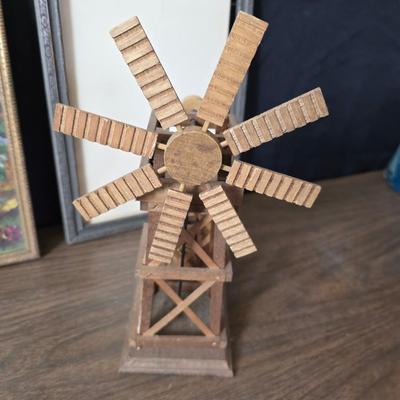 Collecion of vintage home decor - Antique picture frames with prints - windmill music box - old lamp with shade and two men in a canoe