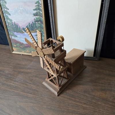 Collecion of vintage home decor - Antique picture frames with prints - windmill music box - old lamp with shade and two men in a canoe