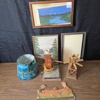 Collecion of vintage home decor - Antique picture frames with prints - windmill music box - old lamp with shade and two men in a canoe