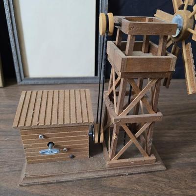 Collecion of vintage home decor - Antique picture frames with prints - windmill music box - old lamp with shade and two men in a canoe