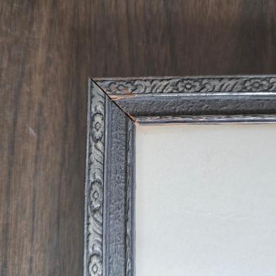 Collecion of vintage home decor - Antique picture frames with prints - windmill music box - old lamp with shade and two men in a canoe