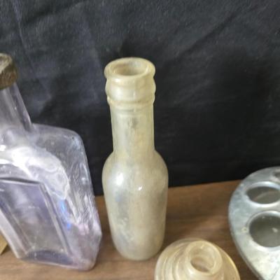 1930s Houze cobalt blue glass sailboat rocker ink blotter. with a collection of old bottles and some canning jars