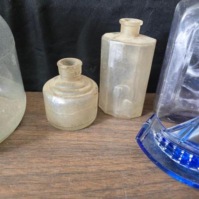 1930s Houze cobalt blue glass sailboat rocker ink blotter. with a collection of old bottles and some canning jars