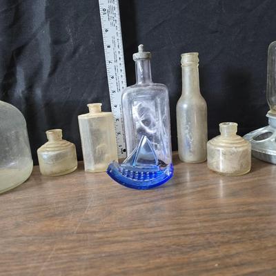 1930s Houze cobalt blue glass sailboat rocker ink blotter. with a collection of old bottles and some canning jars