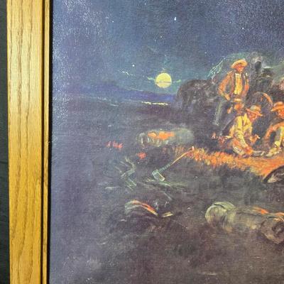 Framed print Laugh Kills Lonesome by artist Charles Marion Russell. with two other pieces of artwork