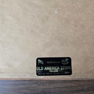 Framed print Laugh Kills Lonesome by artist Charles Marion Russell. with two other pieces of artwork