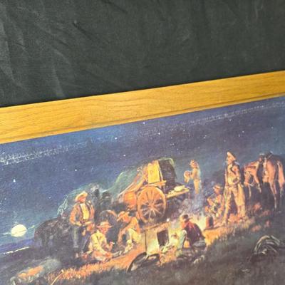 Framed print Laugh Kills Lonesome by artist Charles Marion Russell. with two other pieces of artwork